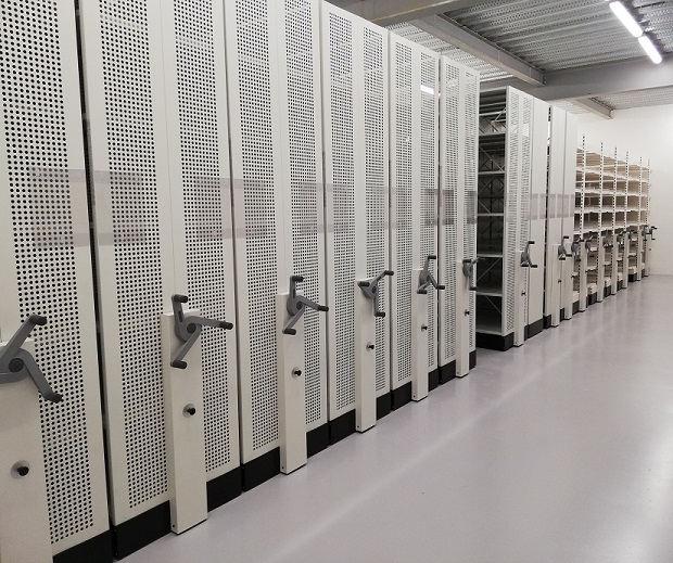 Bright new rotating shelf units for the strongrooms, some for boxes, some for rolled up maps