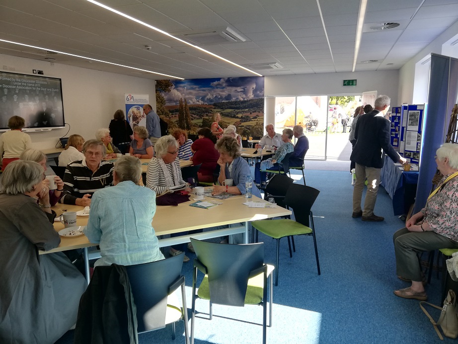 Visitors enjoy cake and tea, whilst the displays of the GDA and Constabulary bring interested parties over