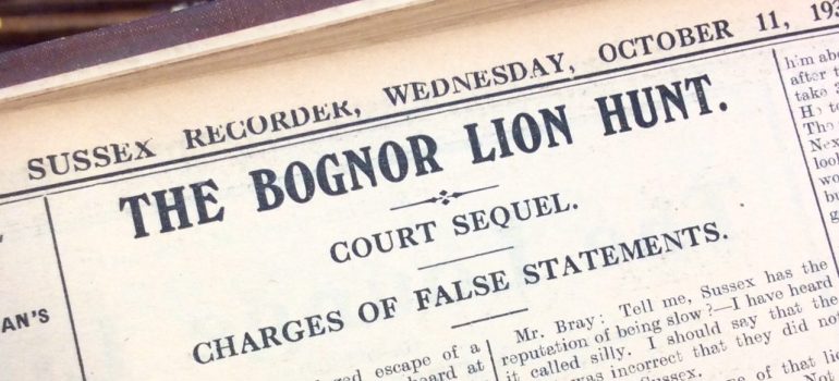 Close up image of a newspaper headline about the court trial