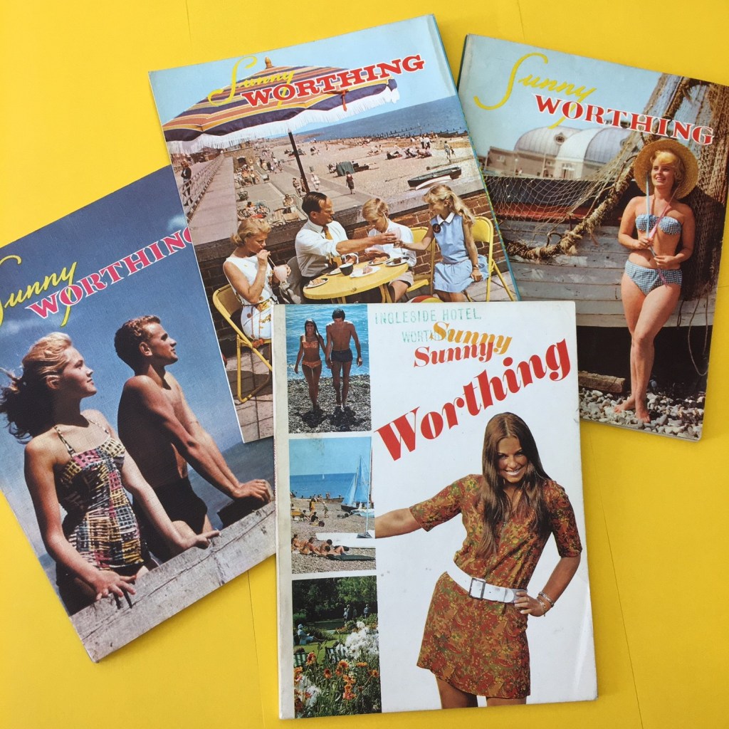 A pile of magazines with colourful photographs