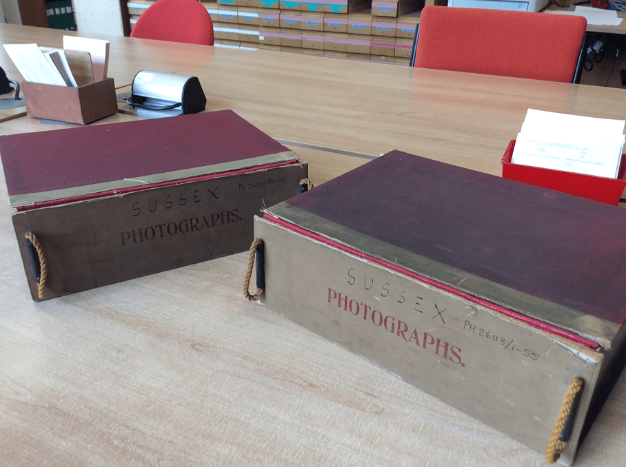 Photograph of the two boxes which contain photographs from within PH 26113