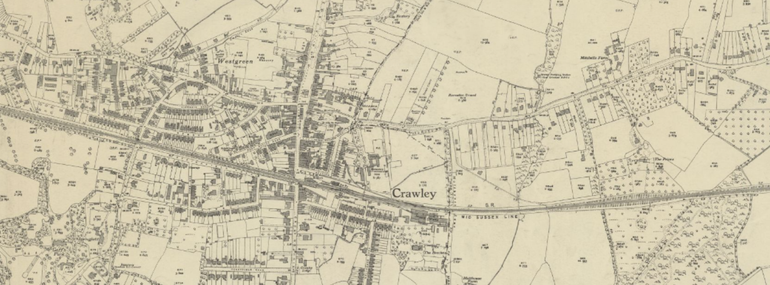 The mid sussex rail line runs through the centre of the town, which is substantially larger with more buildings than the 1839