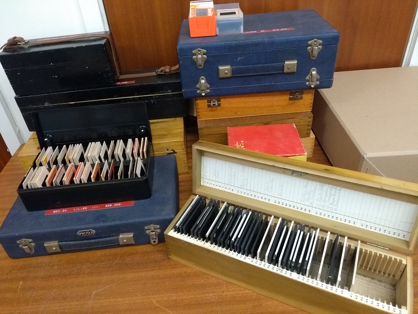 Over a dozen boxes of various sizes and materials for the glass negatives.