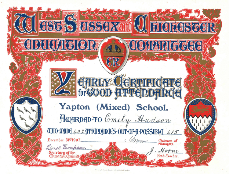 A large and ornate certificate decorated with a thick red, blue and gold floral border.