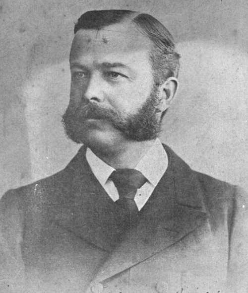 Black and white photographic portrait showing Charles' Corbett's (showing head and shoulders only)