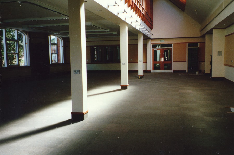 Colour photograph showing the searchroom carpeted and decorated