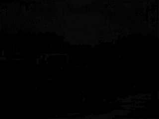 Four very short soundless clips of Worthing films. One black and white of the sea front, one black and white of men shovelling snow into the back of a van, one colour of a newly built road and cars driving along, one of construction work in the centre of town.