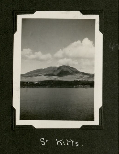 Portrait black and white image of the coast and mountainous landscape of St. Kitts.