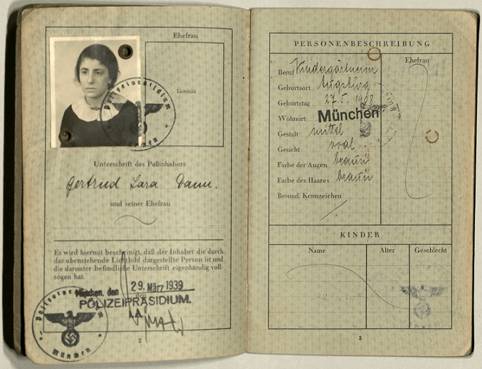 Open two page spread showing her photograph and basic information.