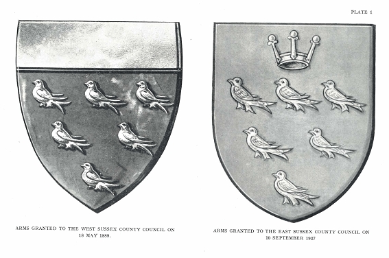 Two black and white shields. The first has a paler band across the top quarter, and six birds - three, two, one - in three rows. The Second has no band, but a small crown above the birds.