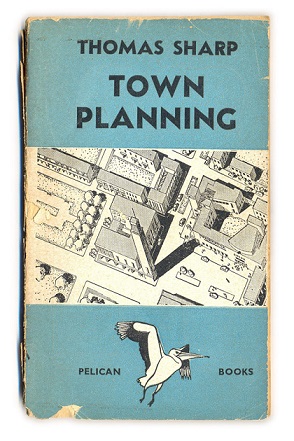 Front cover of Town Planning by Thomas Sharp published by Pelican Books. It has a pale blue cover with an ink sketch of a birds eye view of a town.