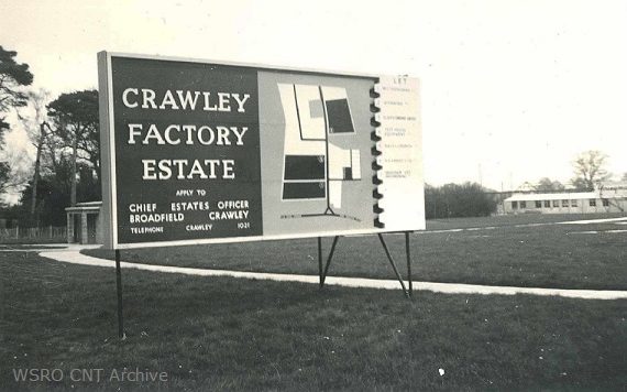 Black and white photograph of the original 1950s sign board for Crawley Factory Estate which includes a stylistic map of the area.